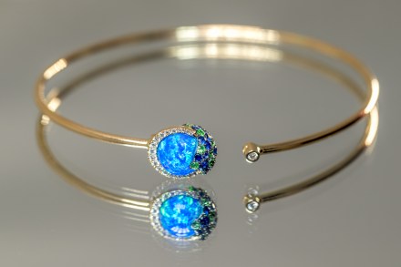 14K yellow gold bracelet set with opal, sapphires, diamonds, and tsavorites, from the Melissani Collection