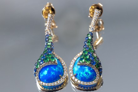 14K yellow gold earrings set with opal, sapphires, diamonds, and tsavorites from the Melissani Collection
